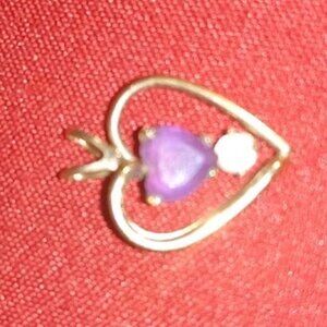 Heart pendant with purple and clear stones, marked 14K G.F. PPO